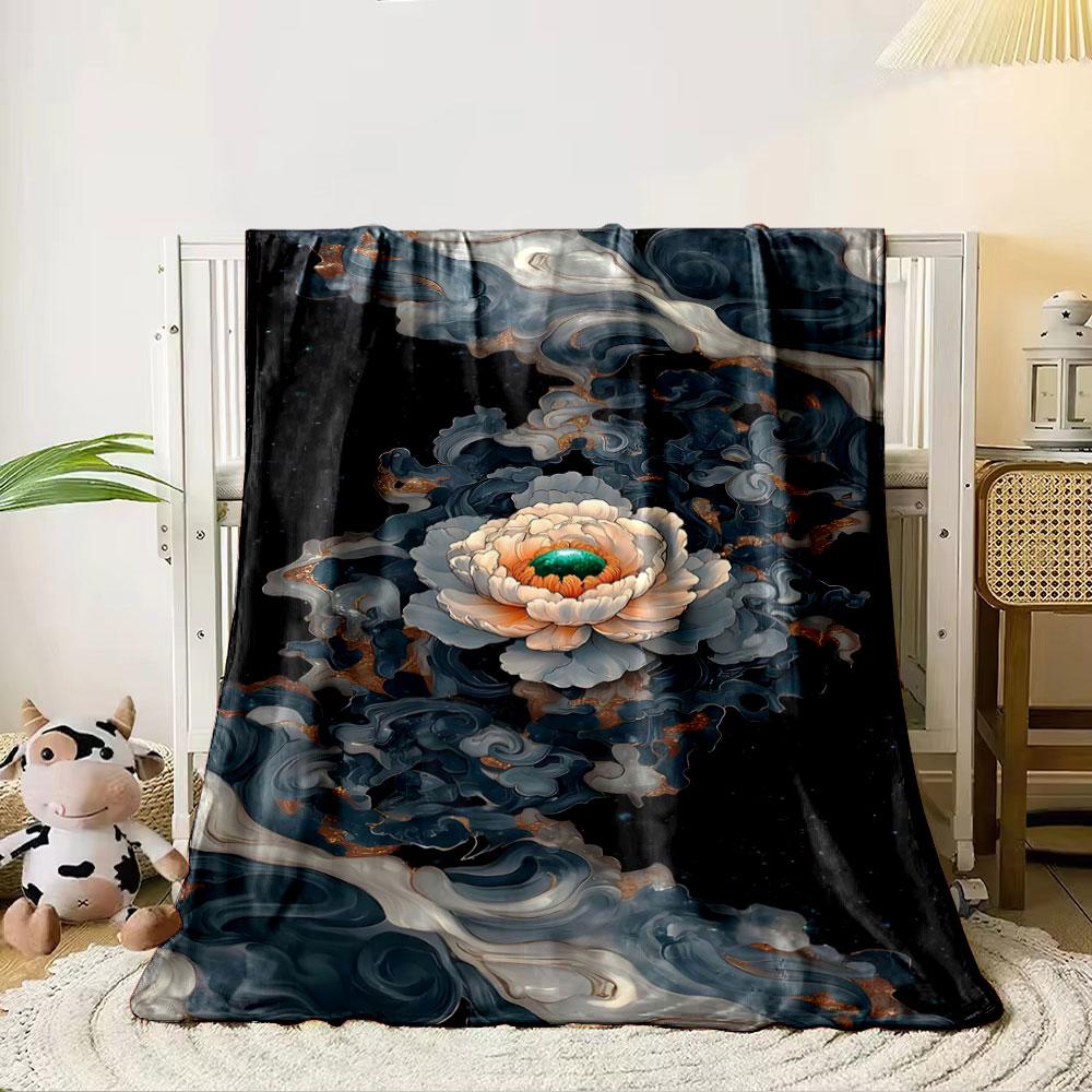 A central flower surrounded by swirling, marble-like dark patterns. for all seasons blanket lunch break throw gift 80cm x 120cm
