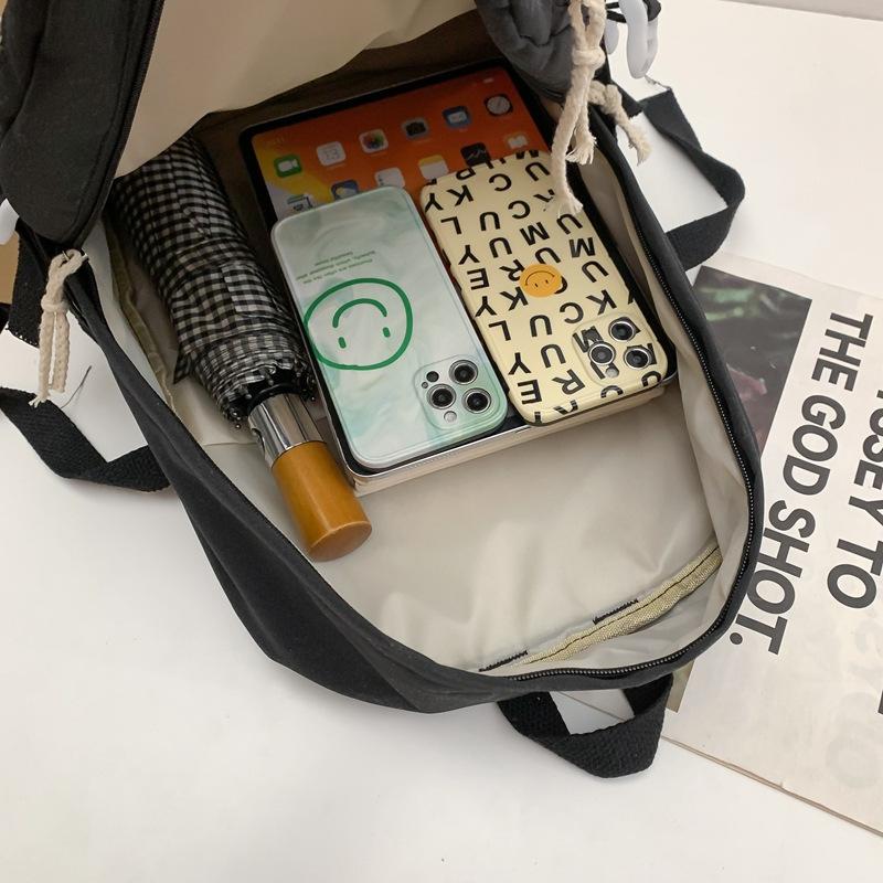 Schoolbag female Korean version student Harajuku female backpack, high school student junior high school ins wind large capacity solid color backpack