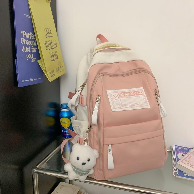 The schoolbag is high-value, fresh and cute, the schoolbag is casual, simple and light, and the commute is versatile and large capacity.