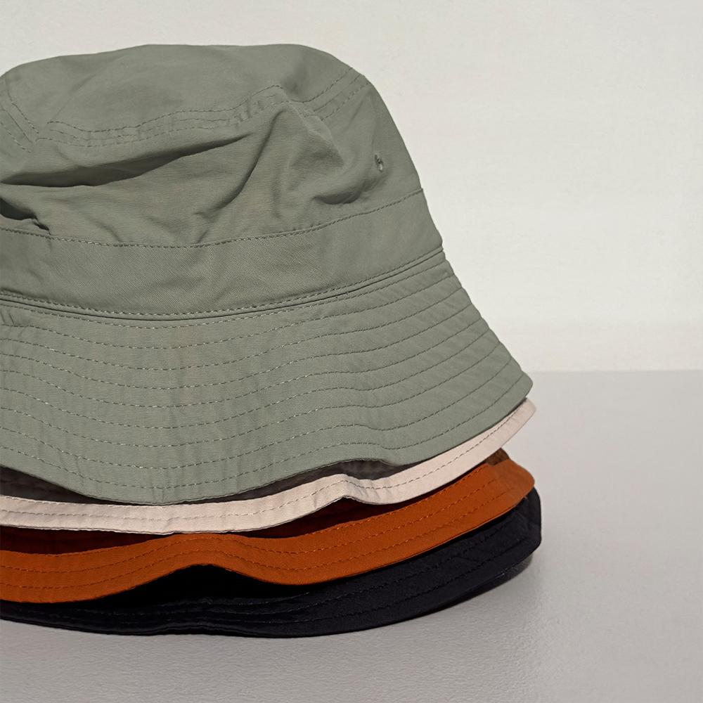 Nyuhaeteun Baumwoll-/Nylon-Eimerhut (Orange)