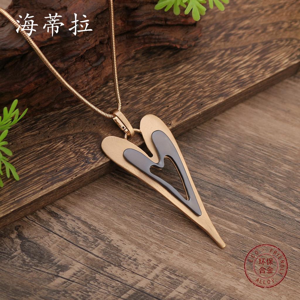 New hollow brushed heart long pendant, women's personalized gun black gold brushed heart long necklace