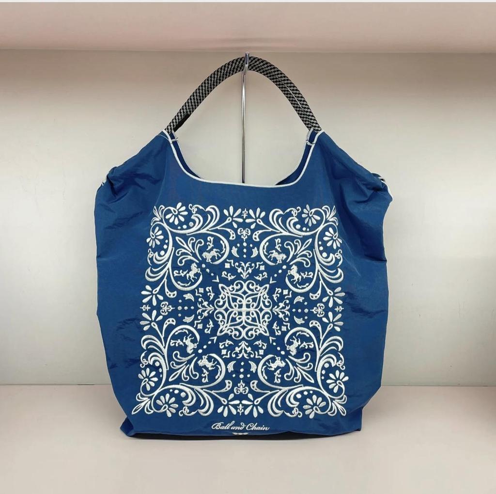 Eco-Friendly Japanese Nylon Handbag with Embroidered Floral Vine Design