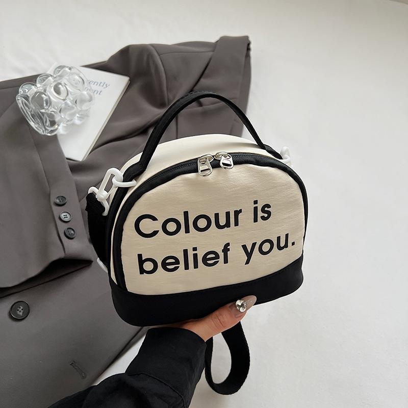 

Simple casual portable small bag women s 2025 new letter printing contrasting color small square bag fashionable shoulder messenger bag