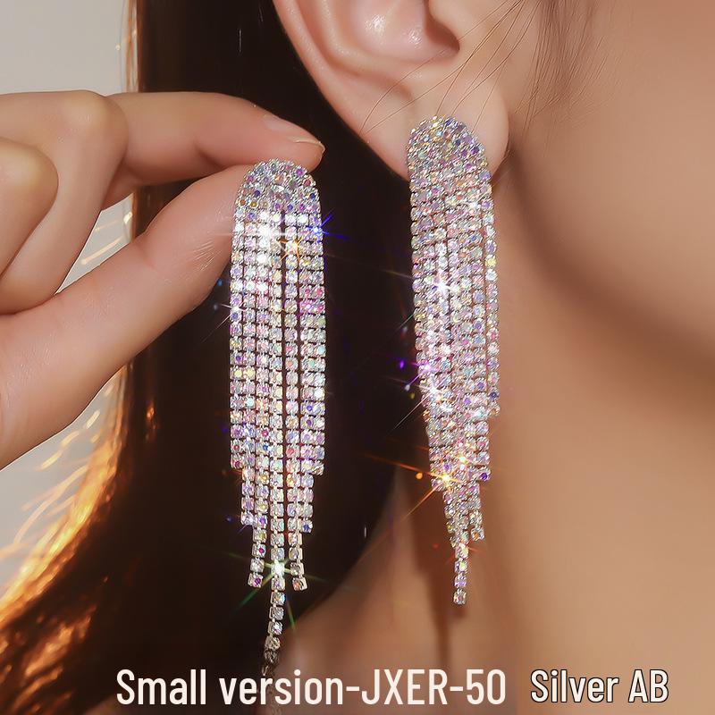 

Длинные серьги-кисточки со стразами в европейском и американском стиле — модное, элегантное и смелое украшение для женщин