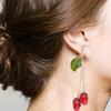 Gothic Skull Earrings in Fashionable Red Vampires Skull Style with Green Leaf Details for Fashion Forward Women