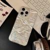 Temperament bow is suitable for iPhone17promax Apple 16IMD mobile phone case, the new 14/15 all-inclusive 13.