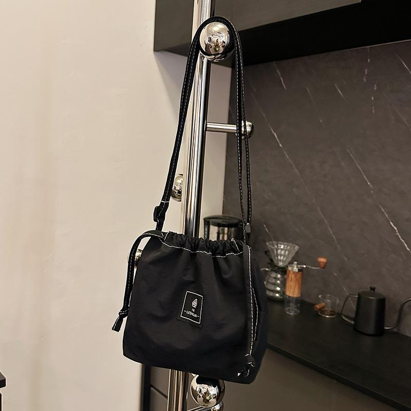 Mobile phone bag women's simple versatile drawstring messenger bag trendy brand shoulder bag leisure sports nylon bag