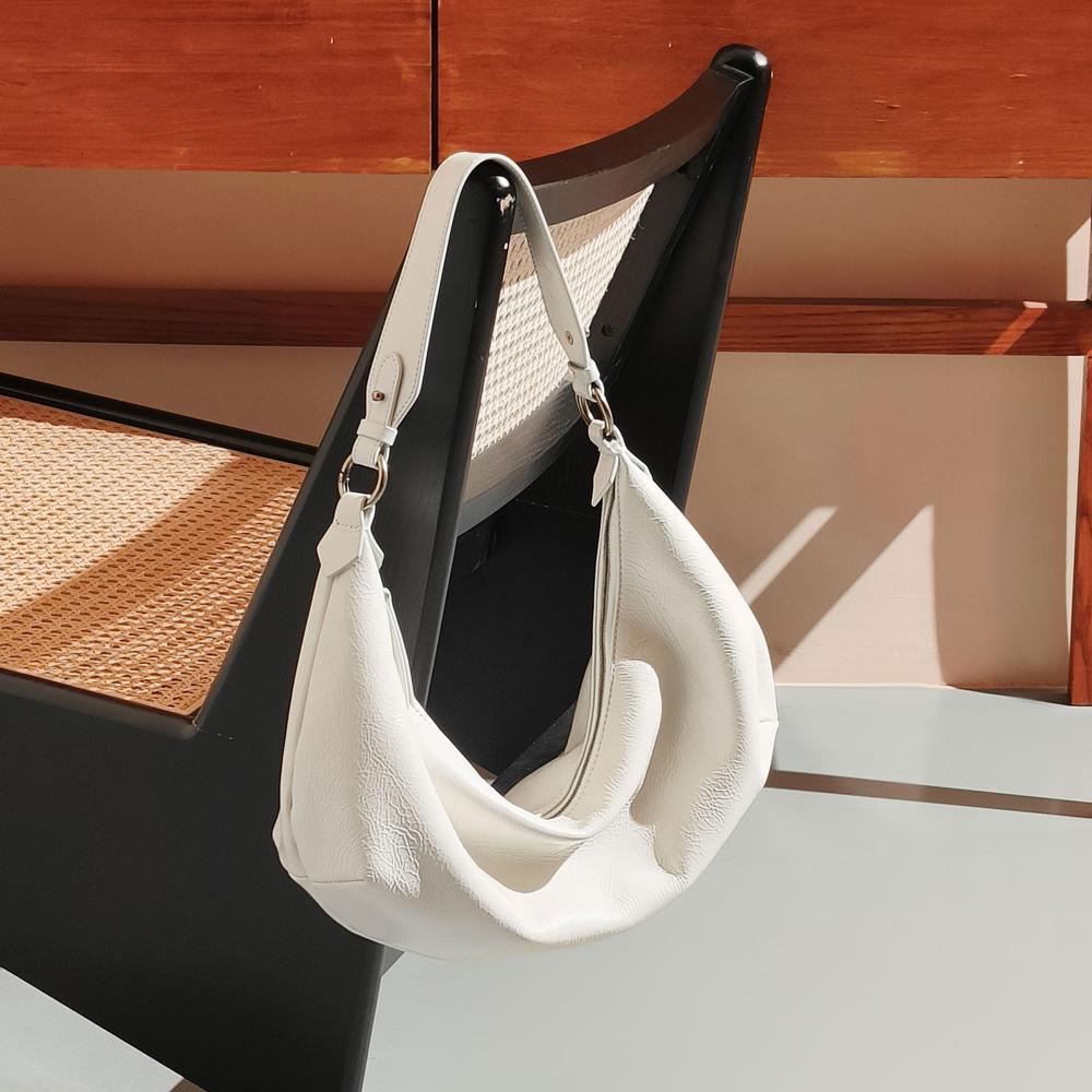 Come to the picture and sample hobo bag commuting high-end bag, support OEM embossing logo genuine leather women's bag