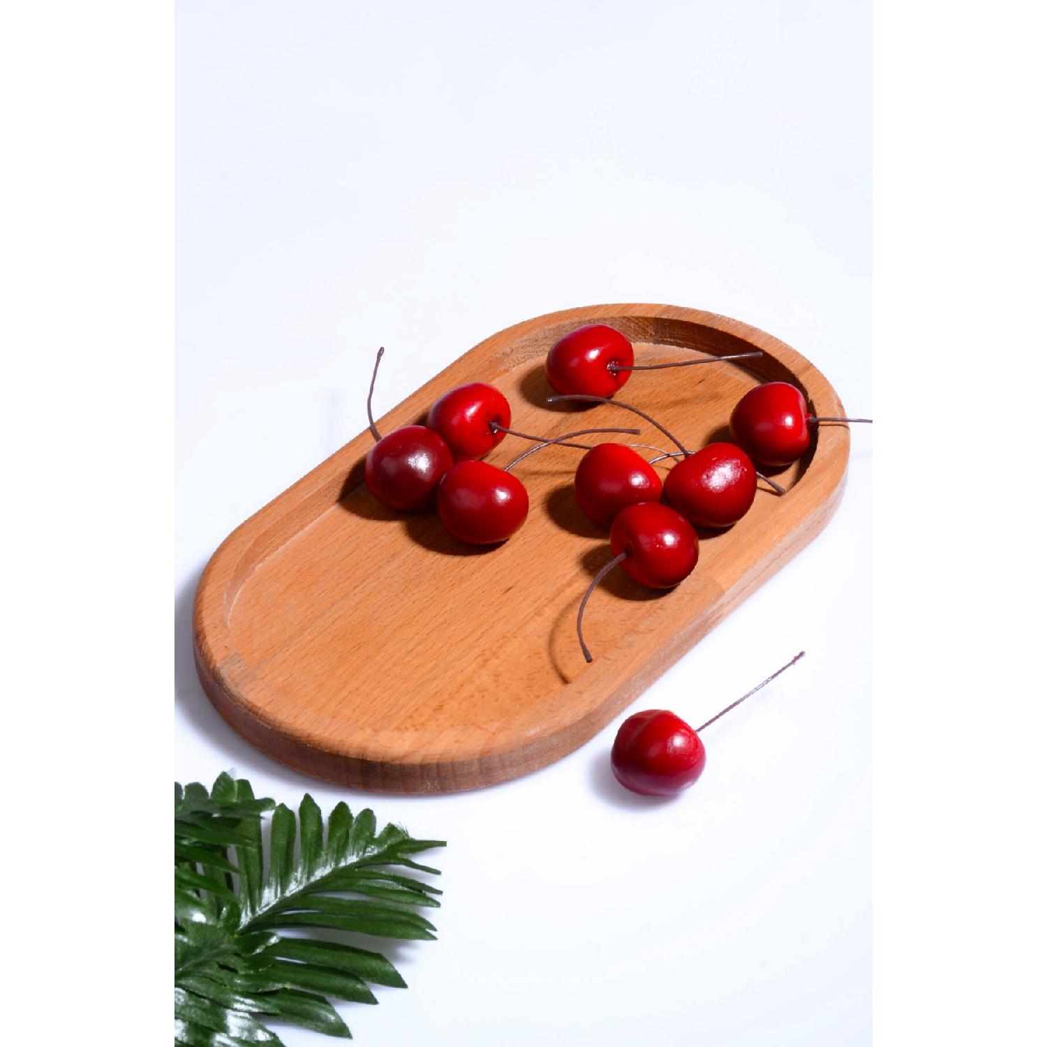 

Овальная сервировочная тарелка из бука 14x25 см -