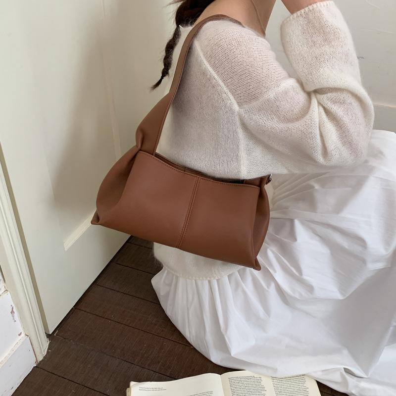 Korean new portable cloud bag women's fashion niche underarm bag simple and versatile commuter shoulder tote bag