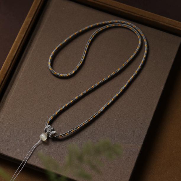 Handmade Braided Non-Metallic Fabric Pendant with Clear Shadow