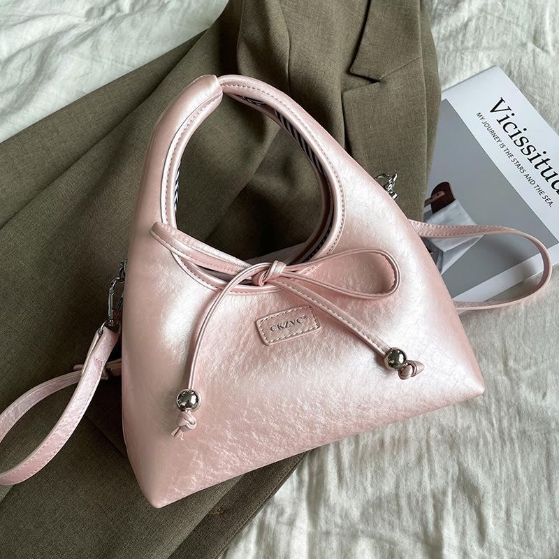 

Popular handbag bag women s 2025 new spring and summer fashion shoulder bucket bag high-end commuter messenger bag розовый