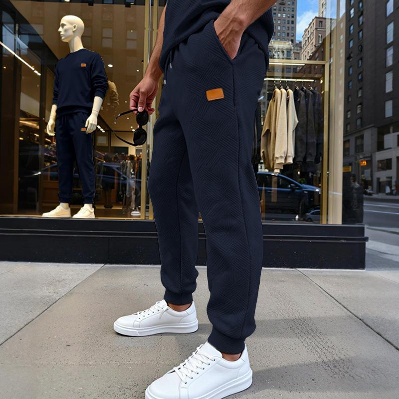 Men's Loose and Simple Casual Sports Commuting Sweatpants with the Same Texture Pattern at the Counter