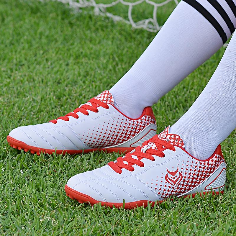 უნისექსის ტყავის რეზინის რბილი ქვედა ფრჩხილის მოკლე ფრჩხილის საფეხბურთო ფეხსაცმელი ახალგაზრდული შეჯიბრის პროფესიული ფეხბურთის ფეხსაცმელი