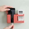Compact Wall Mounted Organizer for Remote Controls and Mobile Phones with Charging Slot