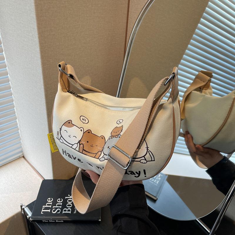 

Niche design canvas dumpling bag women s new cartoon printed shoulder bag versatile messenger bag хаки