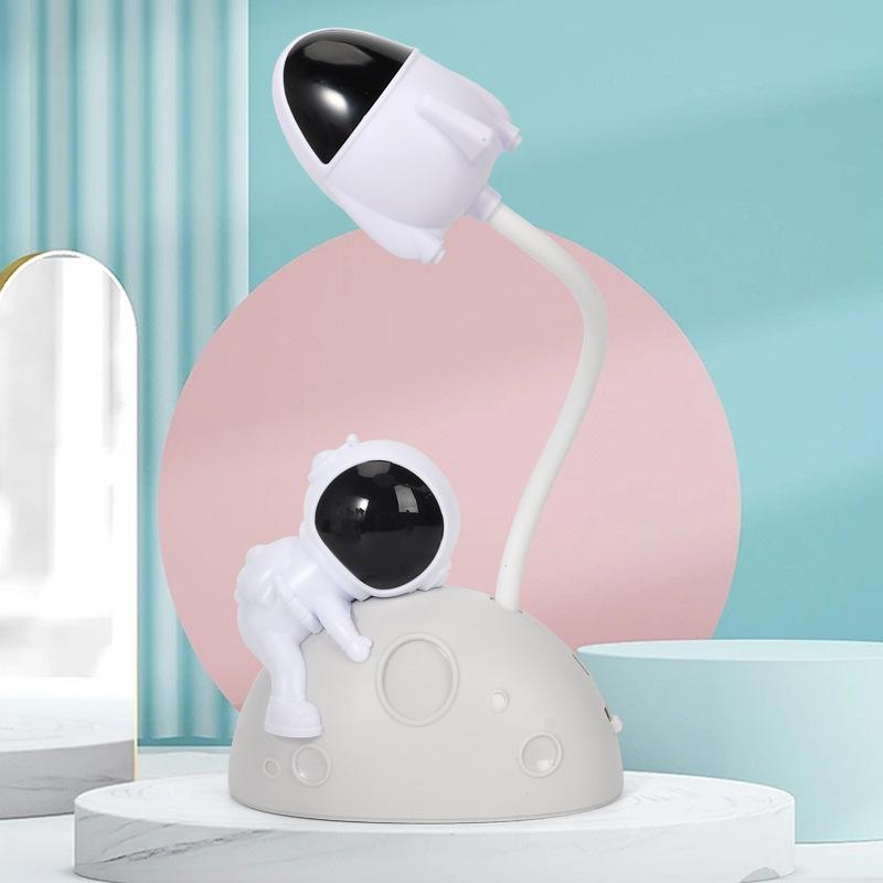 Astronaut LED Night Light: Moon Man Bedside Lamp for Student Dorms, Reading, and Desk Atmosphere.