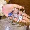 2025 Silver ladies pearl bracelet alloy case rhinestone scale French elegant fashion fairy quartz watch party gift for ladies.