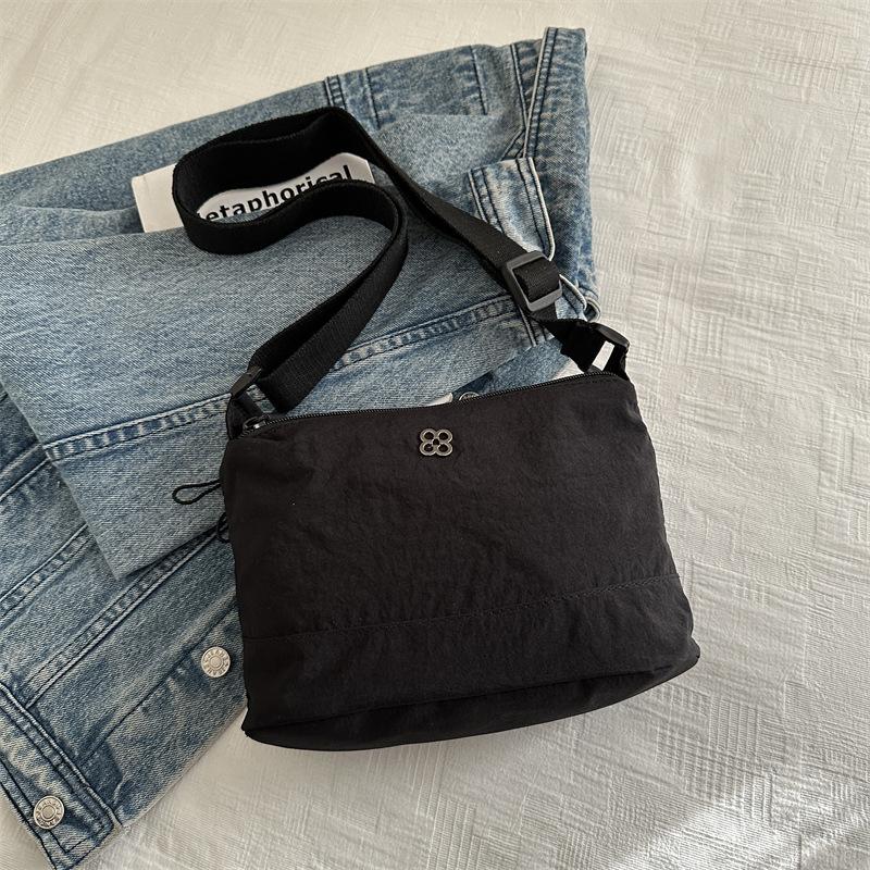 

Маленькая сумка женская сумка-мессенджер 2025 новая универсальная на молнии на плечо нейлоновая сумка для мобильного телефона и мелочи зимняя сумка женская чёрный