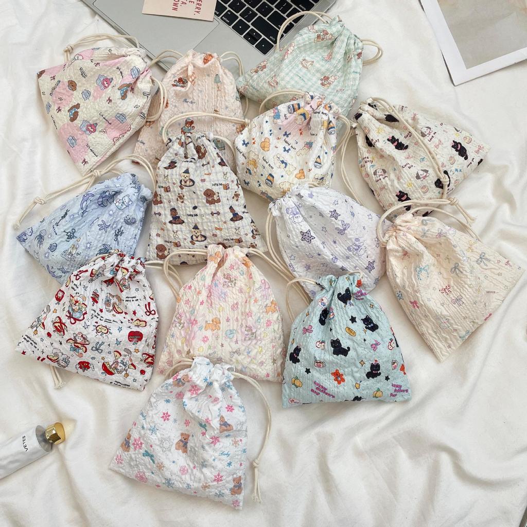 Embossed Cartoon Drawstring Bag - Dustproof Portable Cloth Organizer for Cosmetics