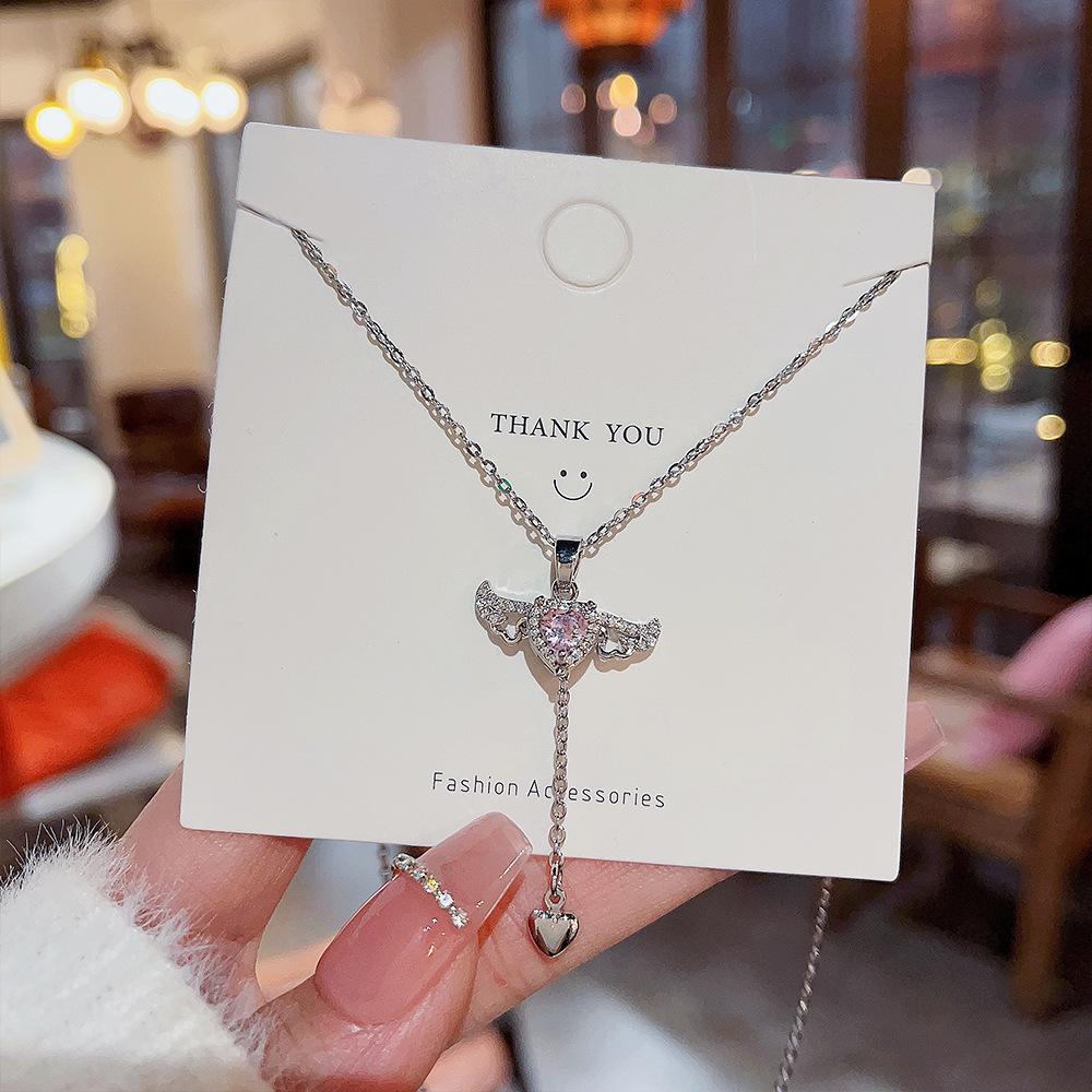 

Личность дизайн чувство титан сталь ожерелье девушка розовый инкрустированный циркон романтический Купидон сердце любовь ключица цепочка серебряный