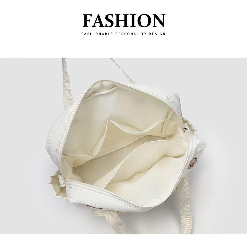 Trendige koreanische Ein-Schulter-Babytrage und Crossbody-Tasche für Mütter