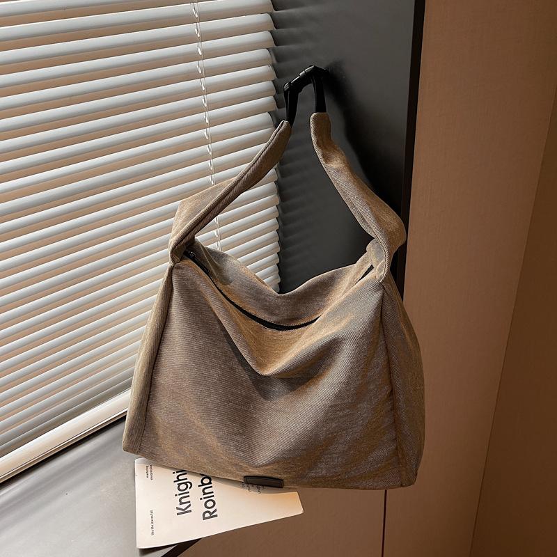 Canvas bag women's large capacity 2025 new autumn and winter leisure relaxation shoulder shopping bag class tote bag