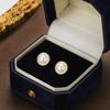 Minimalist Round Pearl Stud Earrings with Metal Frame Simple Small Size Lightweight Design Suitable for Daily Wear and Special Occasions