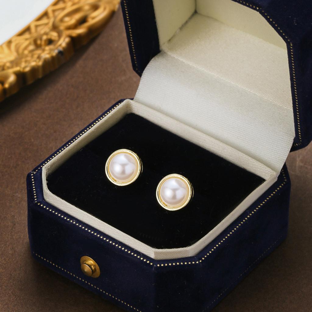Minimalist Round Pearl Stud Earrings with Metal Frame Simple Small Size Lightweight Design Suitable for Daily Wear and Special Occasions