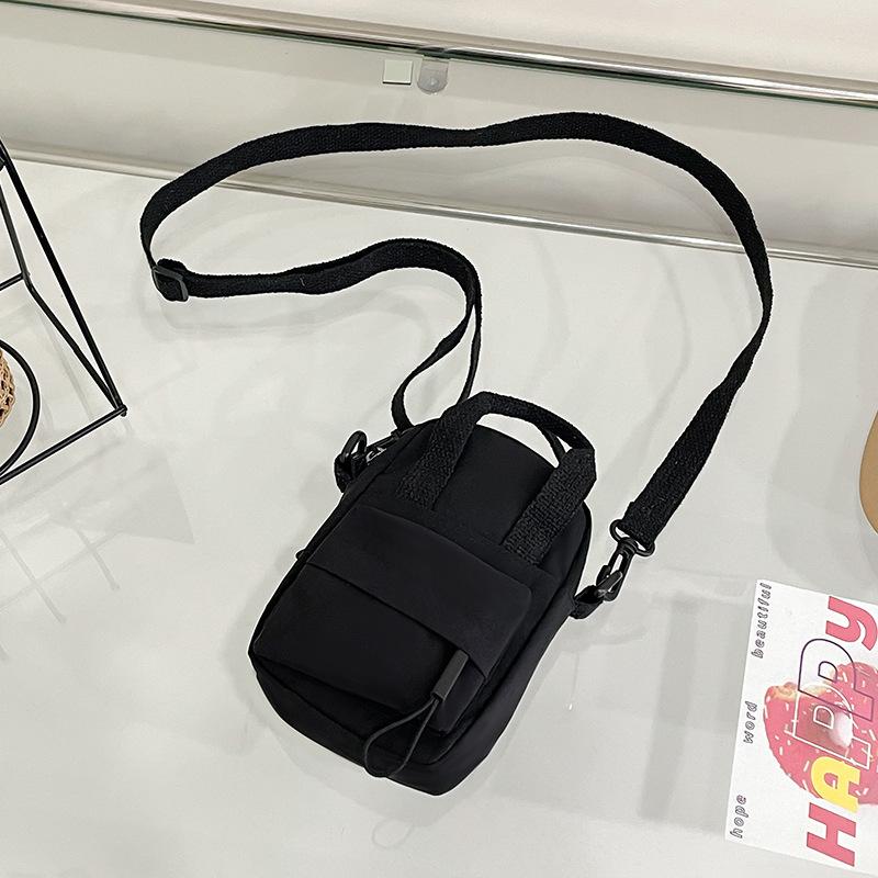 

Trendy brand waterproof shoulder bag mini coin purse niche men s and women s mobile phone bag headphone bag personalized casual shoulder crossbody bag чорний