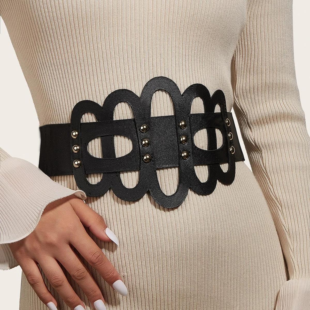 

Stylish wide decorative belt with studded cutout design effortlessly elevates both professional and casual looks. чёрный