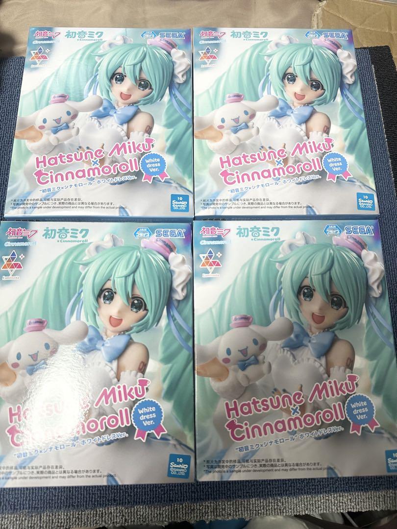 

[USED] Hatsune Miku & Cinnamoroll Collaboration Figures (White Dress Version) - 4 pieces