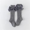 1 Paar Süße Baumwoll-Wadenlange Socken Mit Schleifenmuster-Design Für Kleine Mädchen Alltagsparty