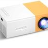 Best-Selling YG300 Yellow-White Mini Portable Projector with Mobile Screen Mirroring for Home Entertainment.