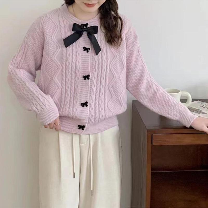 Solid color knitted cardigan women's new autumn and winter bow button with twist sweater jacket