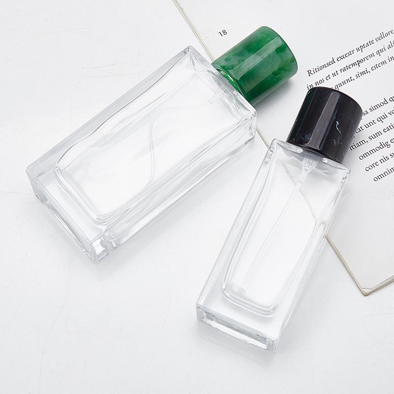 In-Stock Transparent Bayonet Glass Perfume Bottle with Resin Lid and Spray Refill