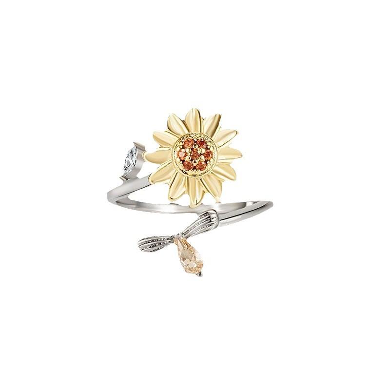 Japanese-Korean Fashion Rotating Flower Women's Ring - Light Luxury Plated Copper Style