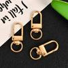 Versatile White Heart Zinc Alloy Keychain Connector with Irregular Shape and Spring Clasp