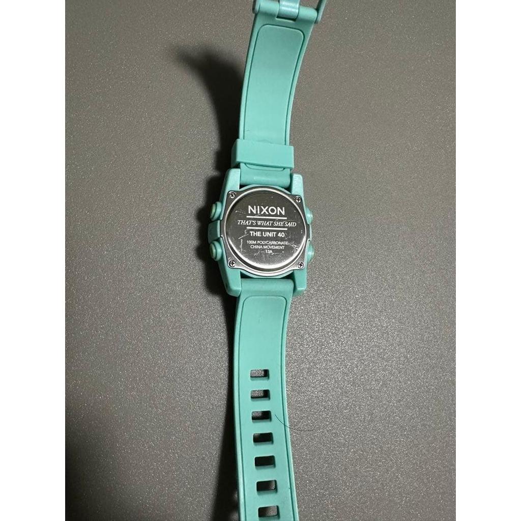 Used Nixon wristwatch, dead battery, black, no parts removed after belt adjustment