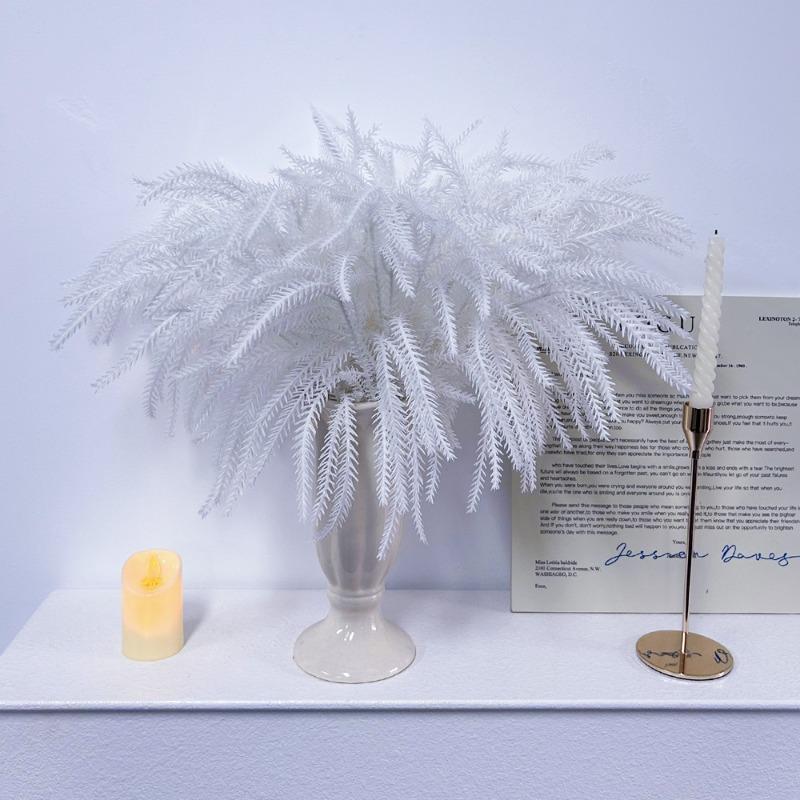 A White Halloween Home Decoration Piece Made of Simulated Artificial Plastic Norfolk Pine Needles
