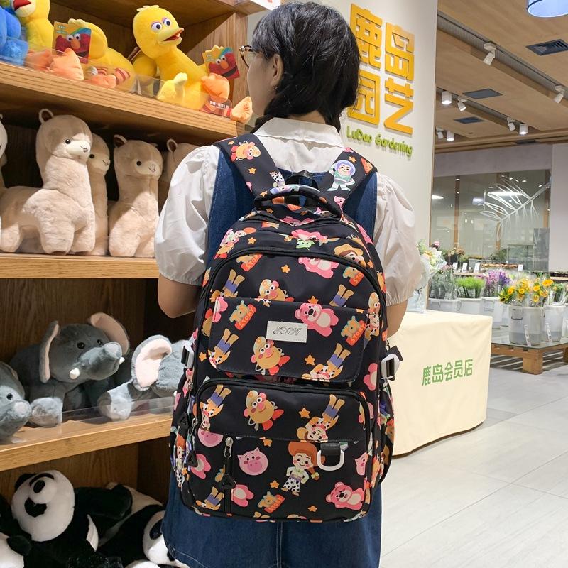 Fashion Korean version lightweight backpack girls cute print going out leisure backpack large capacity primary and secondary school student schoolbag