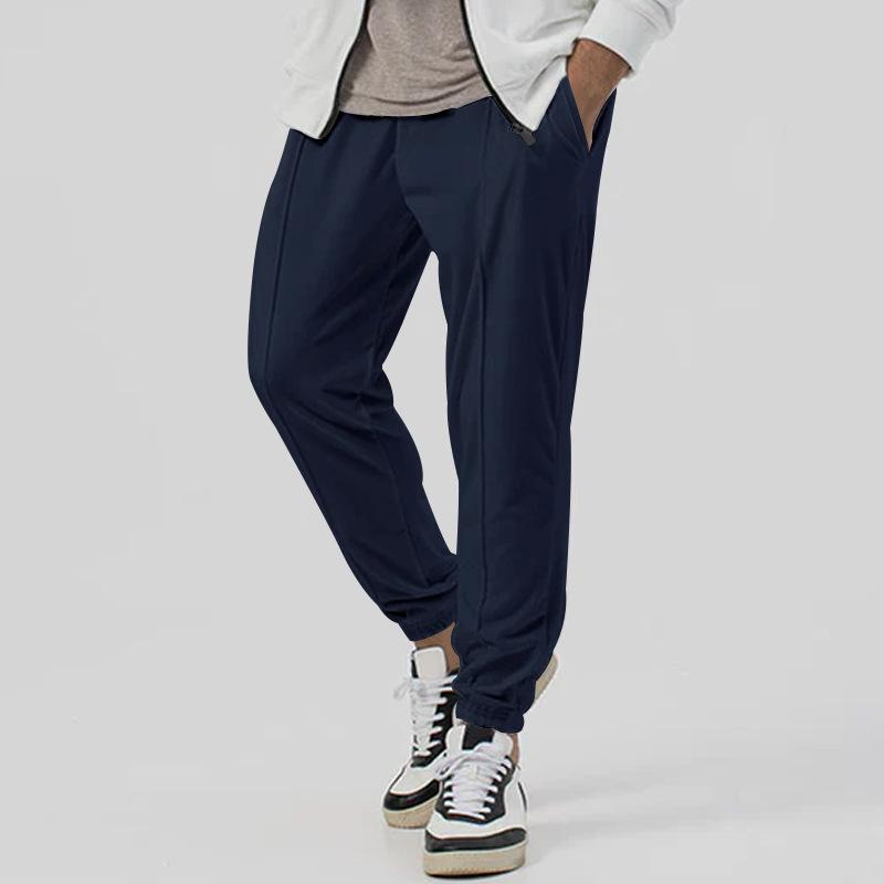 

New Sports Trousers Men s Autumn and Winter Solid Colour Casual Trousers Guard Trousers Loose Drawstring Trousers Trend XXXL темно-синього кольору