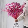 An artificial butterfly branch used for weddings, family offices, parties, decorating vases, and floral arrangements