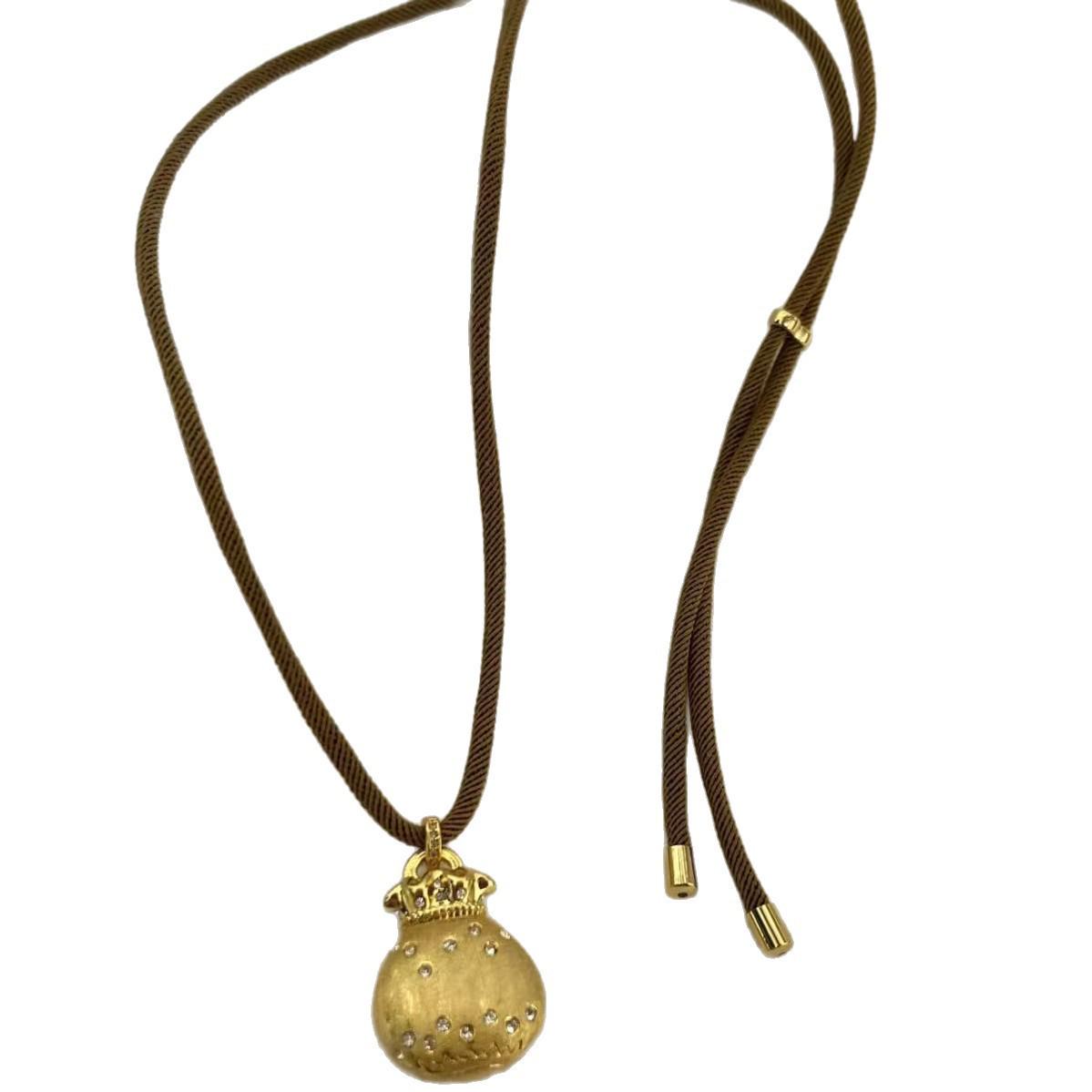 Brushed Gold Women s Money Bag Pendant Necklace: New Chinese Style Autumn/Winter Clavicle & Sweater Chain