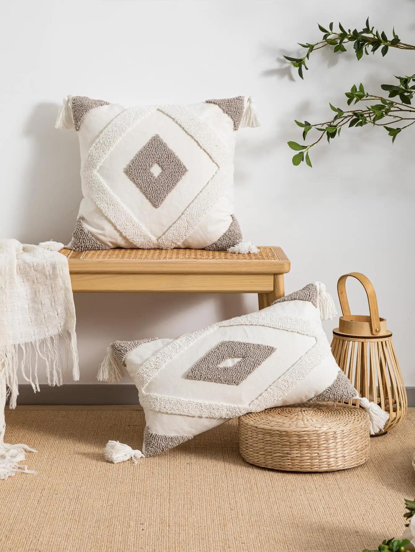 

A beige geometric diamond shaped pillow cover made of bohemian cotton sail fabric with loop velvet technology for sofas, bedroom 300mmx500mm