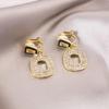 Elegant Clip-On Triangle Earrings for Non-Pierced Ears - Versatile, Light Luxury for Everyday Wear.