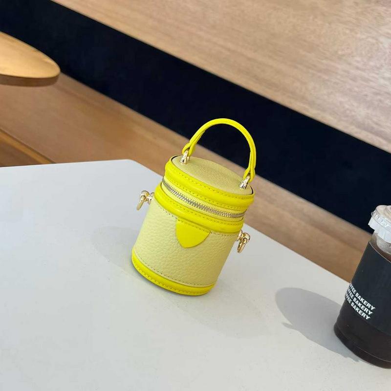 2026 new leather women's bag cylindrical vertical mini lunch box bucket bag chain earphone bag cosmetic bag cross-border batch
