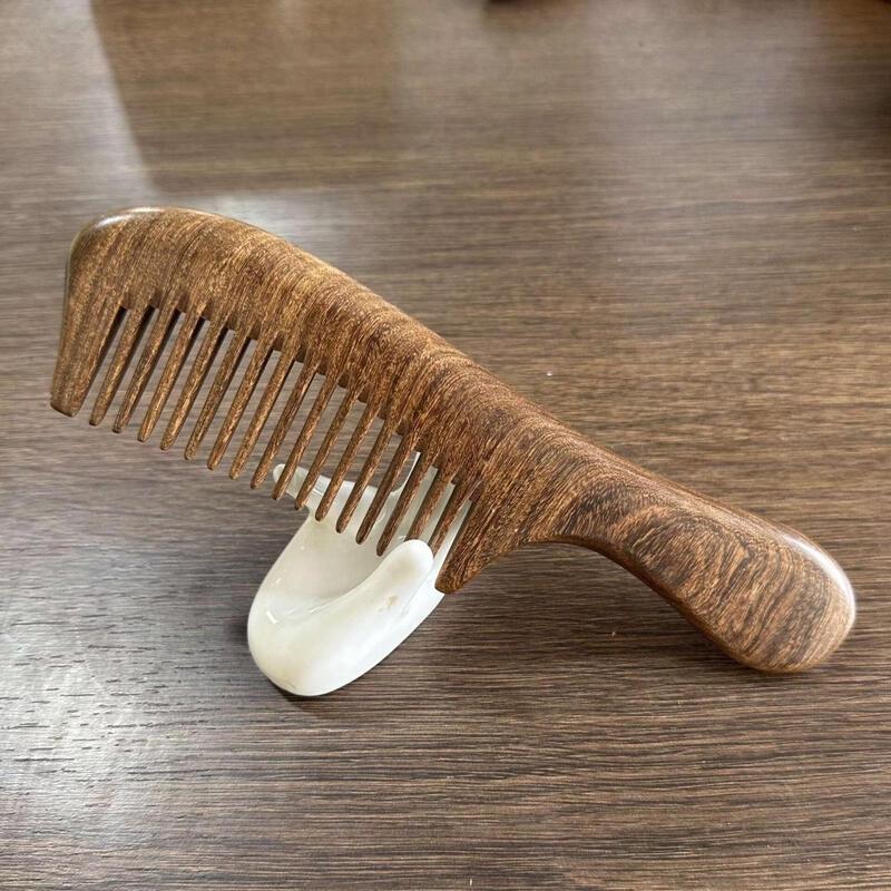 

Black Gold Sandalwood Wide-Tooth Long Handle Comb
