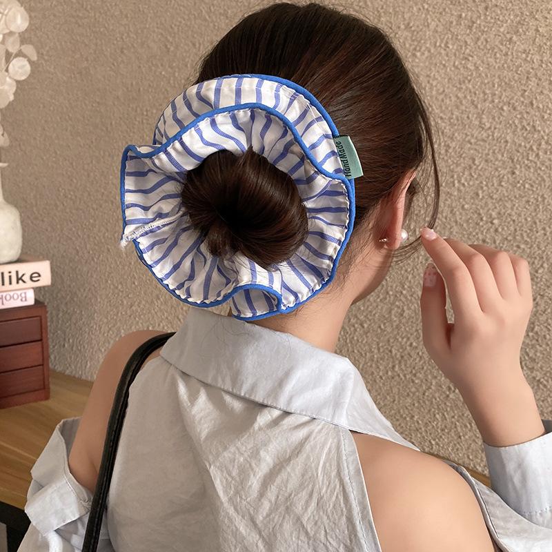 

Korean yellow striped large intestine hair band female high-end sense ball head hair rope sweet hair jewelry