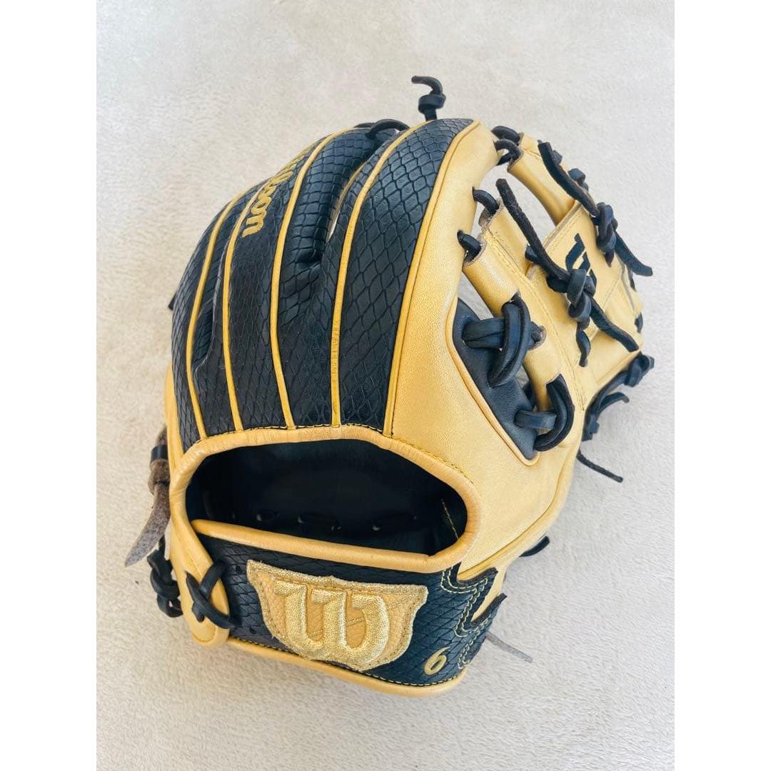 Used Wilson soft order glove type 86 gold x black